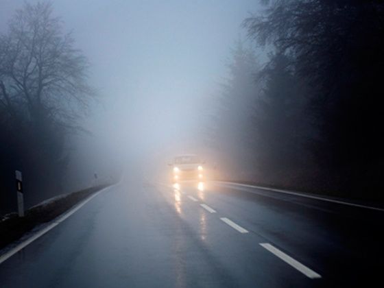 Driving on the highway in fog Driving on the highway in fog