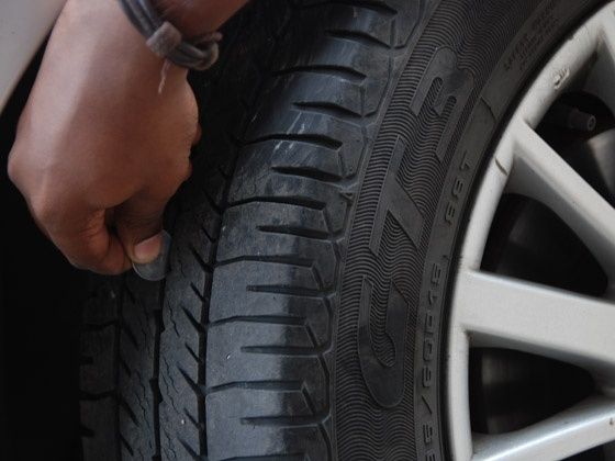 Put the rupee coin to know if there is even tread wear Put the rupee coin to know if there is even tread wear