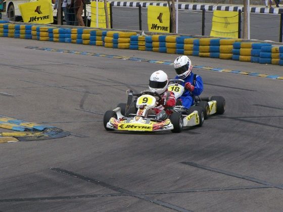 Pradyumn V Danigond (Team Mohites Racing) and Mira Kirit Erda (Team Maini Racing) going neck to neck in the Micro Max final race - Round 1 Pradyumn V Danigond (Team Mohites Racing) and Mira Kirit Erda (Team Maini Racing) going neck to neck in the Micro Max final race - Round 1