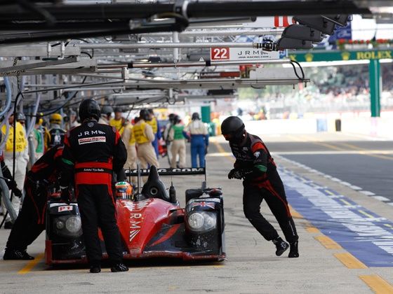 JRM team in action at the pits JRM team in action at the pits