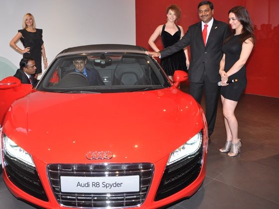 Audi Bhopal showroom opening - Mr. Gaurav Anand, Managing Director, Audi Bhopal (Anand Cars Private Ltd) sitting insise Audi R8 Sypder and Nauheed Cyrusi Audi Bhopal showroom opening - Mr. Gaurav Anand, Managing Director, Audi Bhopal (Anand Cars Private Ltd) sitting insise Audi R8 Sypder and Nauheed Cyrusi