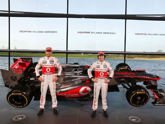 Jenson Button and Sergio Perez with the McLaren MP4-28