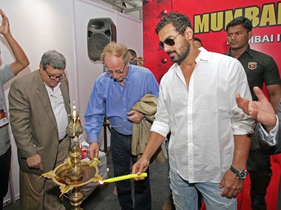 John Abraham and Hannu Mikkola light the inauguration lamp at MIMS 2013 John Abraham and Hannu Mikkola light the inauguration lamp at MIMS 2013