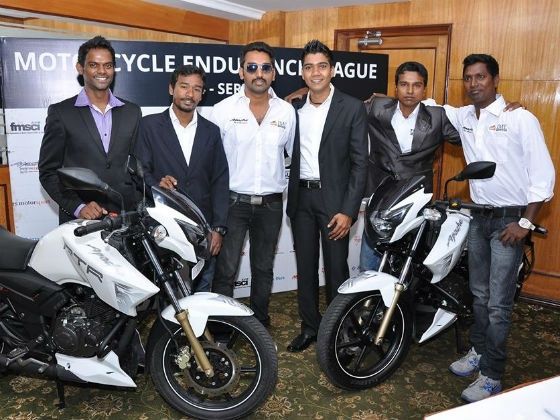 Riders pose with the TVS Apace RTR 180 at IML press launch Riders pose with the TVS Apace RTR 180 at IML press launch