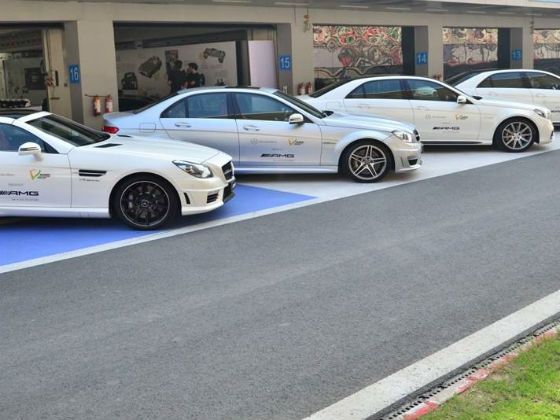 Car lineup in the pit lane - SLK 55 AMG, C 63 AMG and E 63 AMG... the SLS AMG is on track Car lineup in the pit lane - SLK 55 AMG, C 63 AMG and E 63 AMG... the SLS AMG is on track