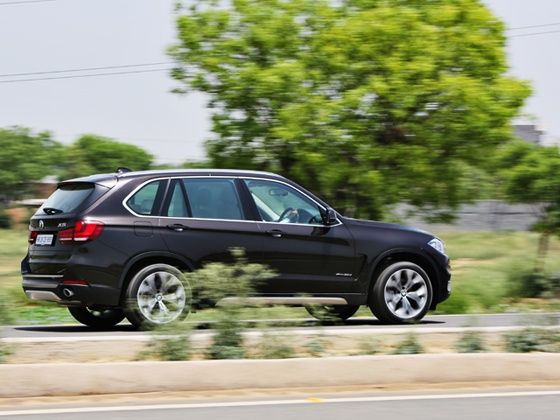 2014 BMW X5 rear action shot 2014 BMW X5 rear action shot