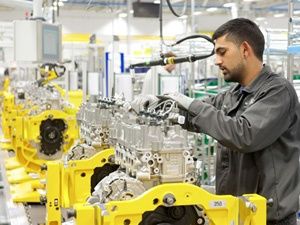 Jaguar Land Rover opens new engine plant in the UK Engineer working at Jaguar Land Rover new engine plant
