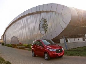 Mahindra e2o electric car parked outside the factory Mahindra e2o electric car parked outside the factory