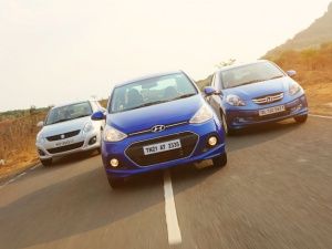 Honda Amaze vs Hyundai Xcent vs Maruti-Suzuki Swift Dzire Diesel Comparison Review: In Pictures! Honda Amaze vs Maruti Suzuki Dzire vs Hyundai Xcent Diesel